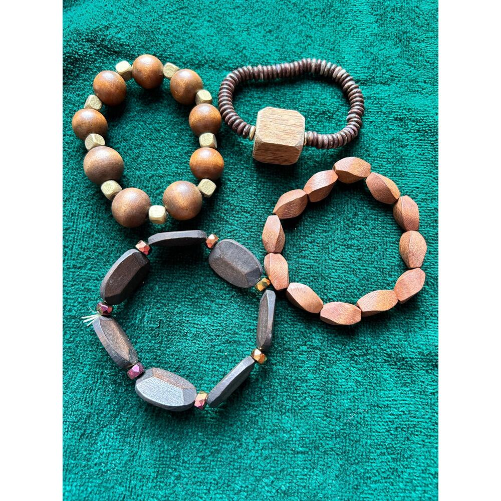 Four wood bracelets
